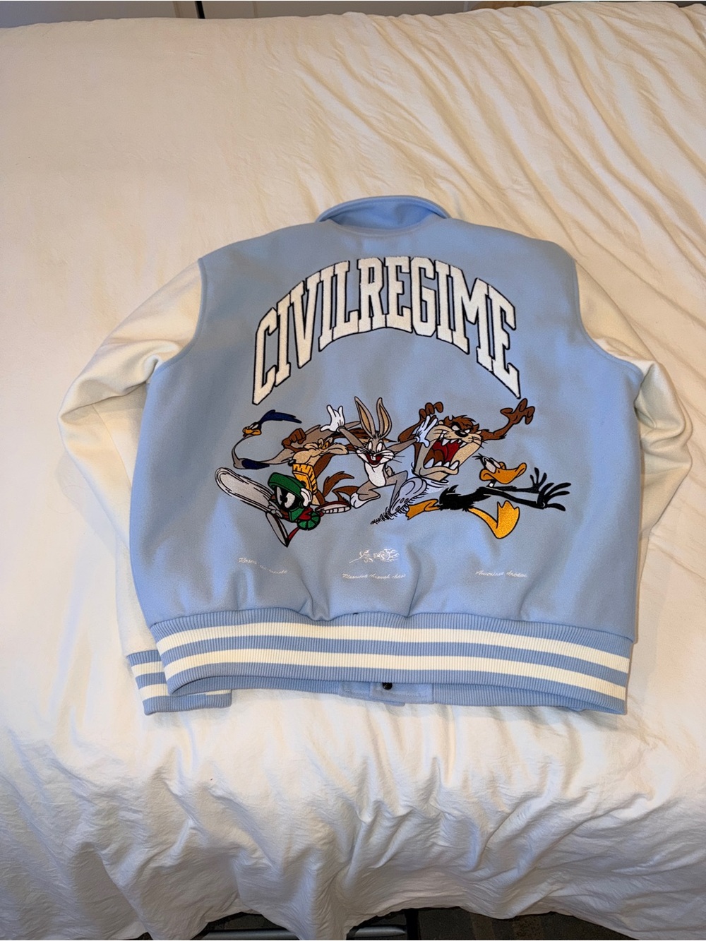 Civil Regime Light Blue & White Varsity Bomber Jacket with Looney Tunes Patch
